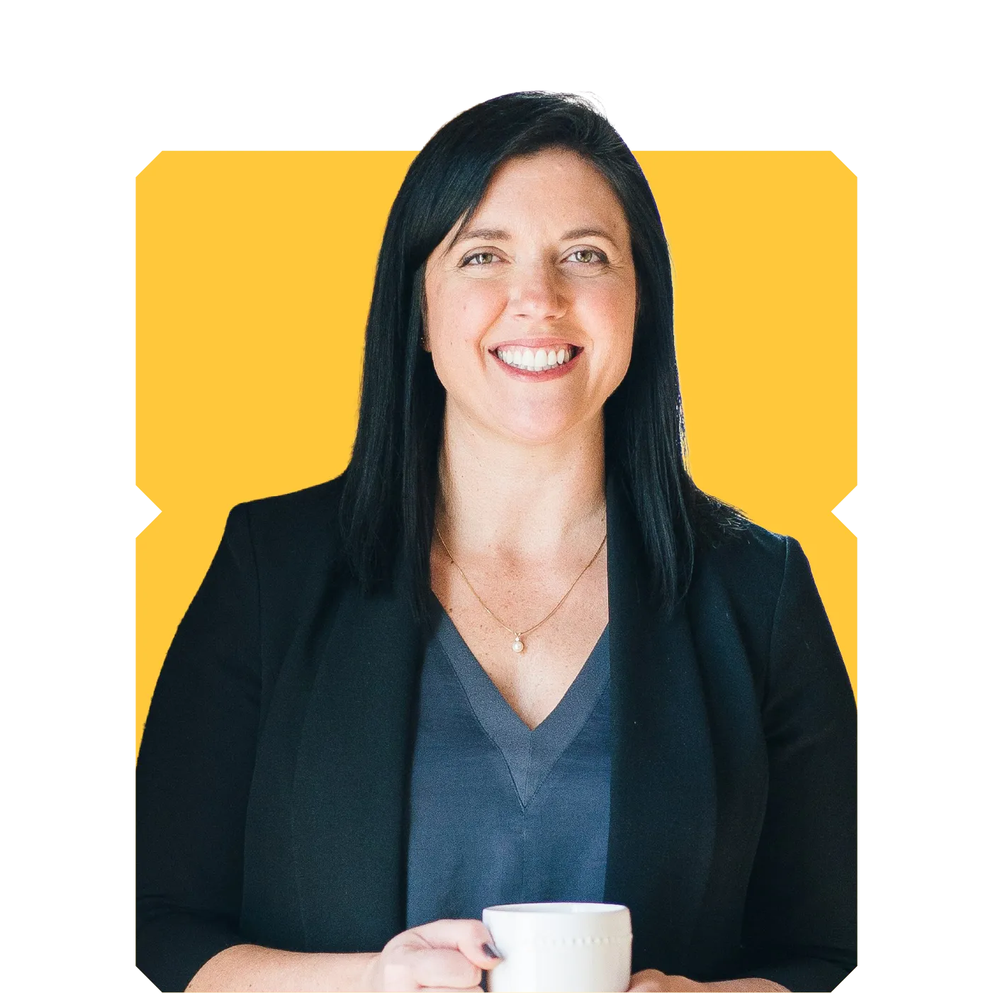 Smiling professional woman in black blazer holding a white coffee mug against a yellow background