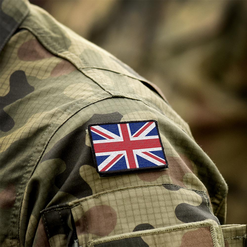 Union Jack shoulder badge on a camouflage military uniform sleeve